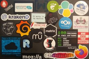 A laptop covered with stickers after FOSDEM2020